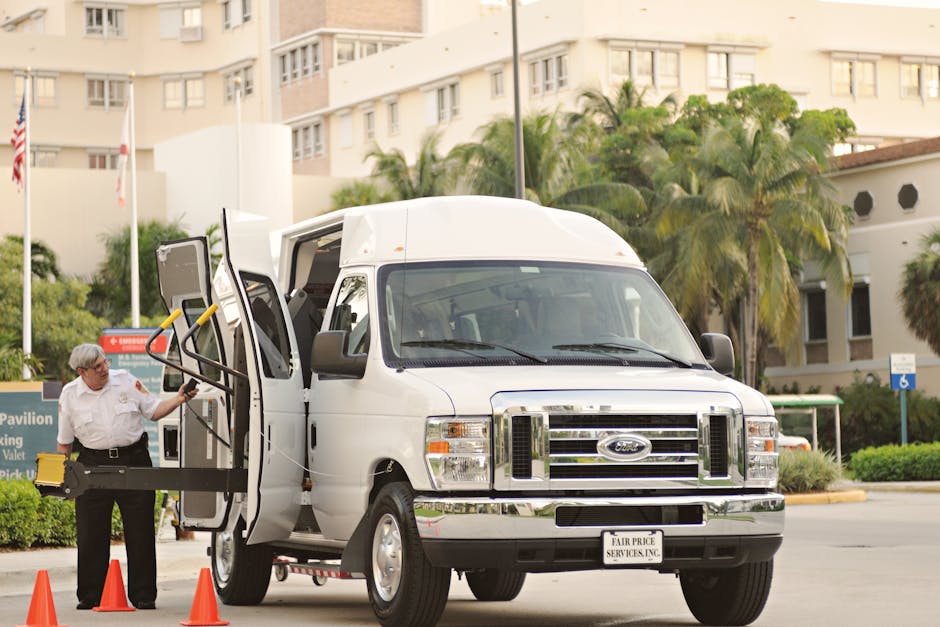 White van with wheelchair lift - Care Transit Solutions