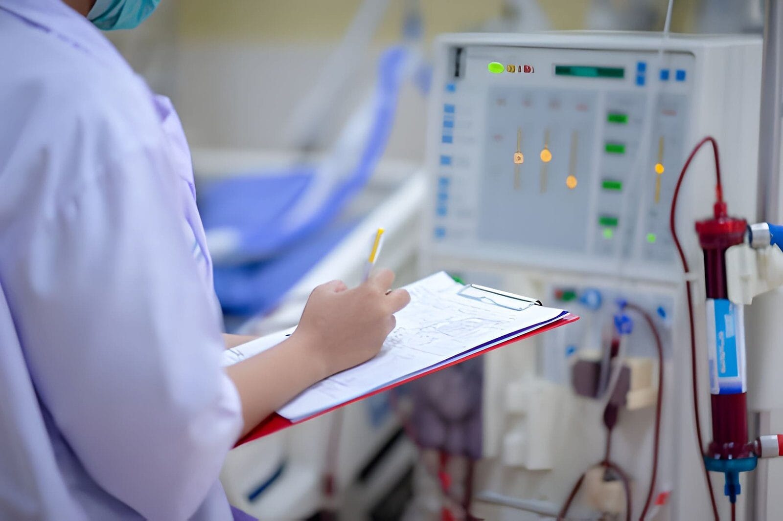 Medical worker near equipment - Care Transit Solutions
